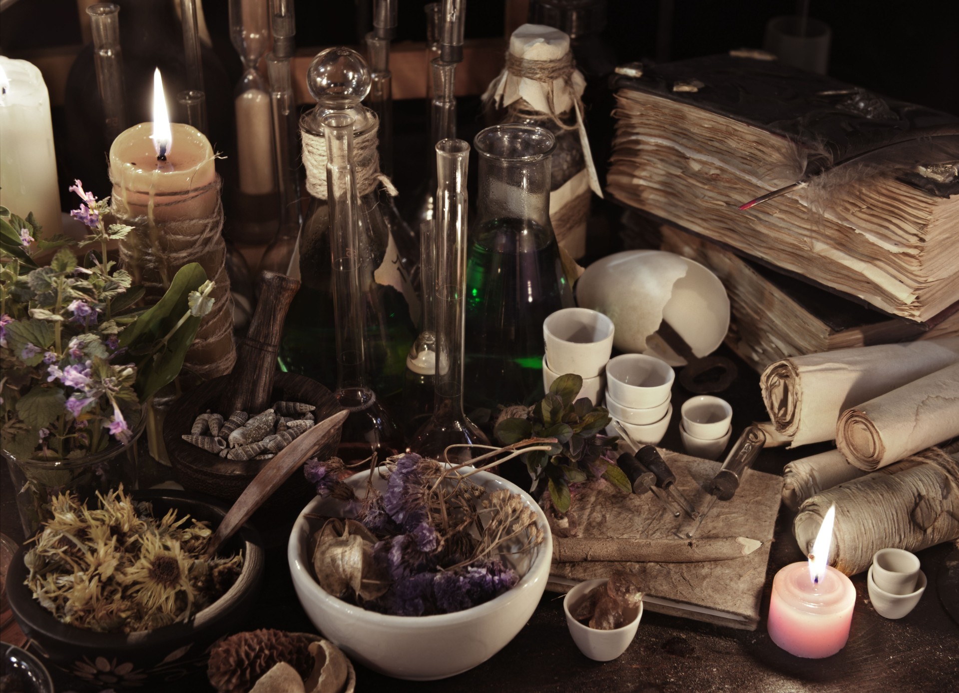 Still life with witch books, scrolls, herbs and magic objects